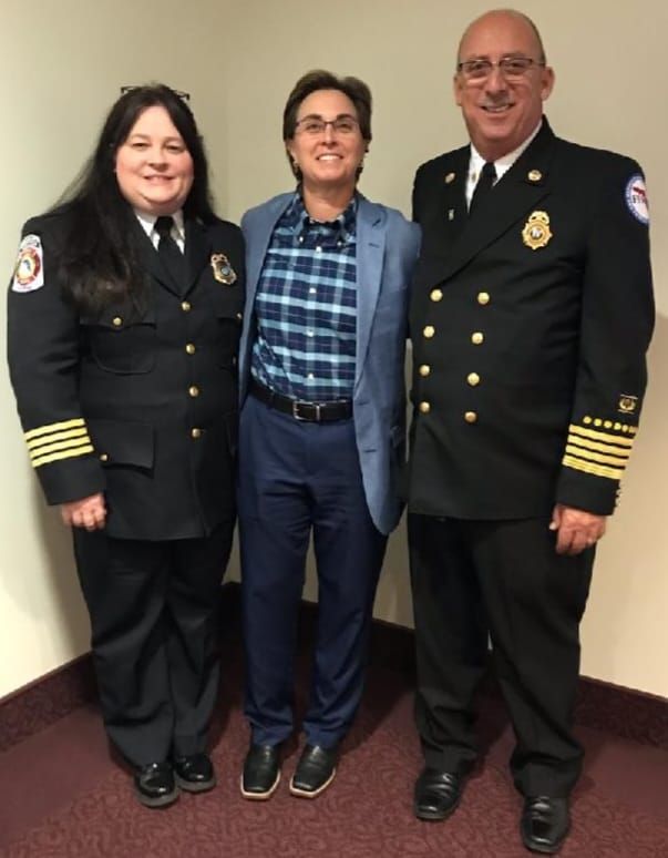 Owner Suzanne Saults with Florida fire marshalls