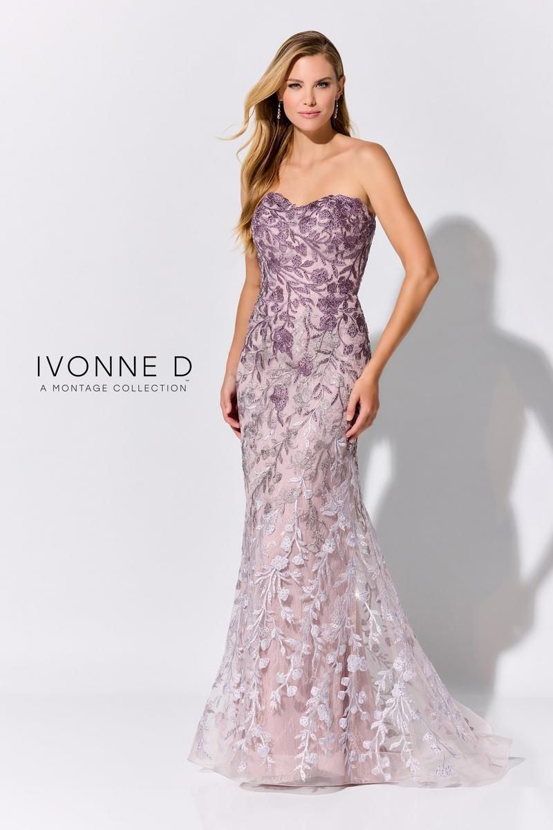 A woman is wearing a purple strapless dress by vonne d