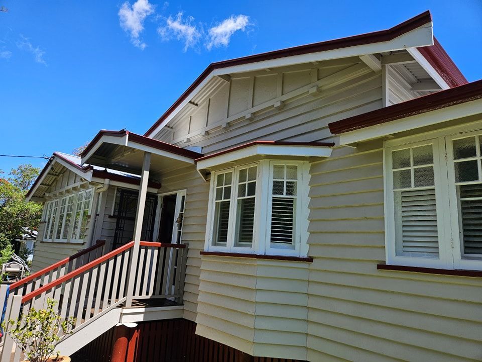 A white house with a red roof and stairs — O & D House Wash & Cleaning Services in Pittsworth, QLD