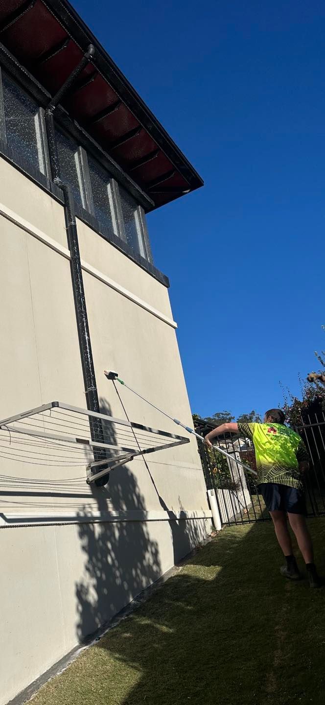 A Man is Cleaning the House — O & D House Wash & Cleaning Services in Cambooya, QLD