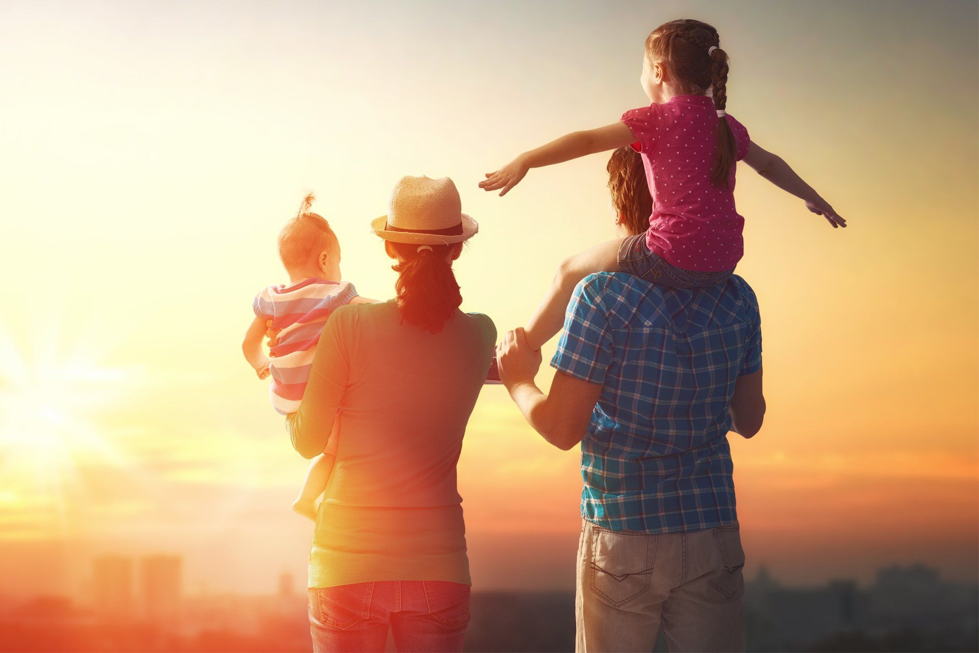 Happy Family Looking at the Sunset