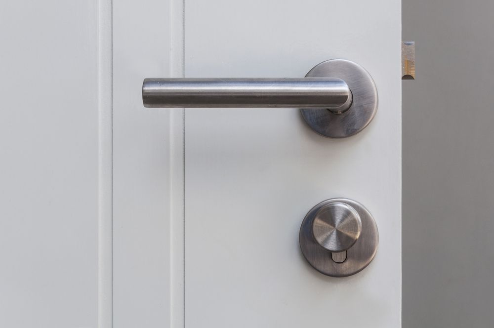 Close Up Of A Door With A Key — Dependable Locksmiths in Taree, NSW