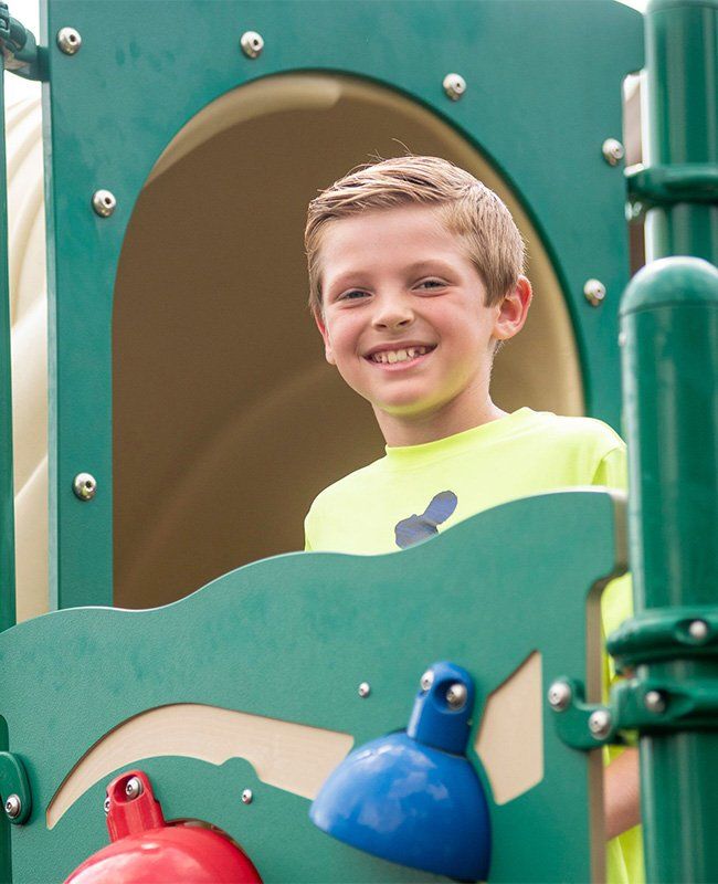 Boy on  a Play Park — Mokena, IL — Triple R Child Care