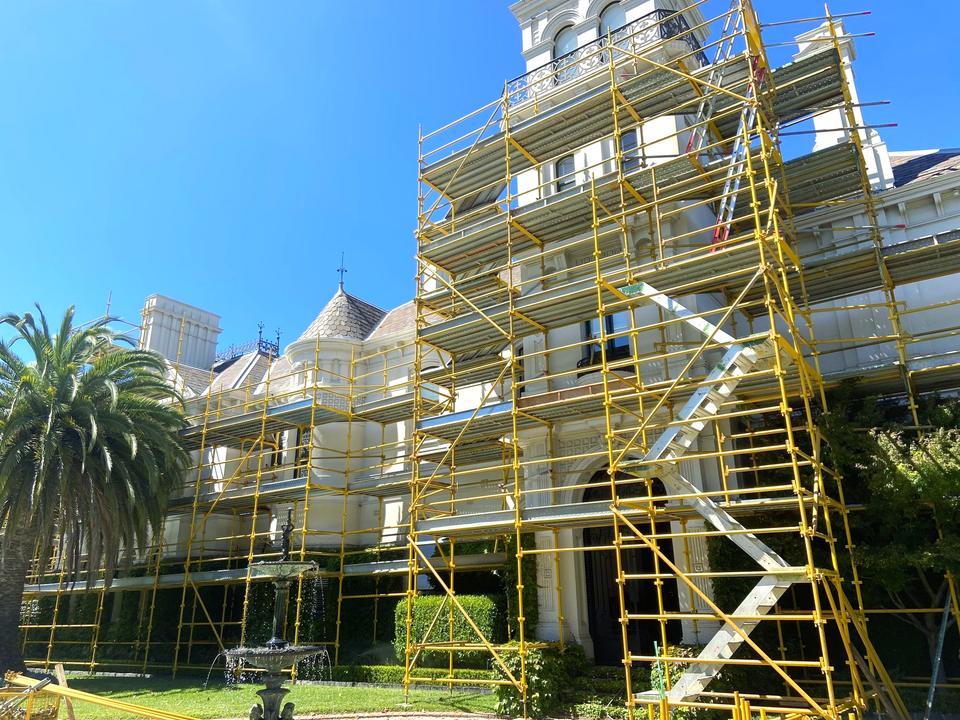 A large building with a lot of scaffolding around it.