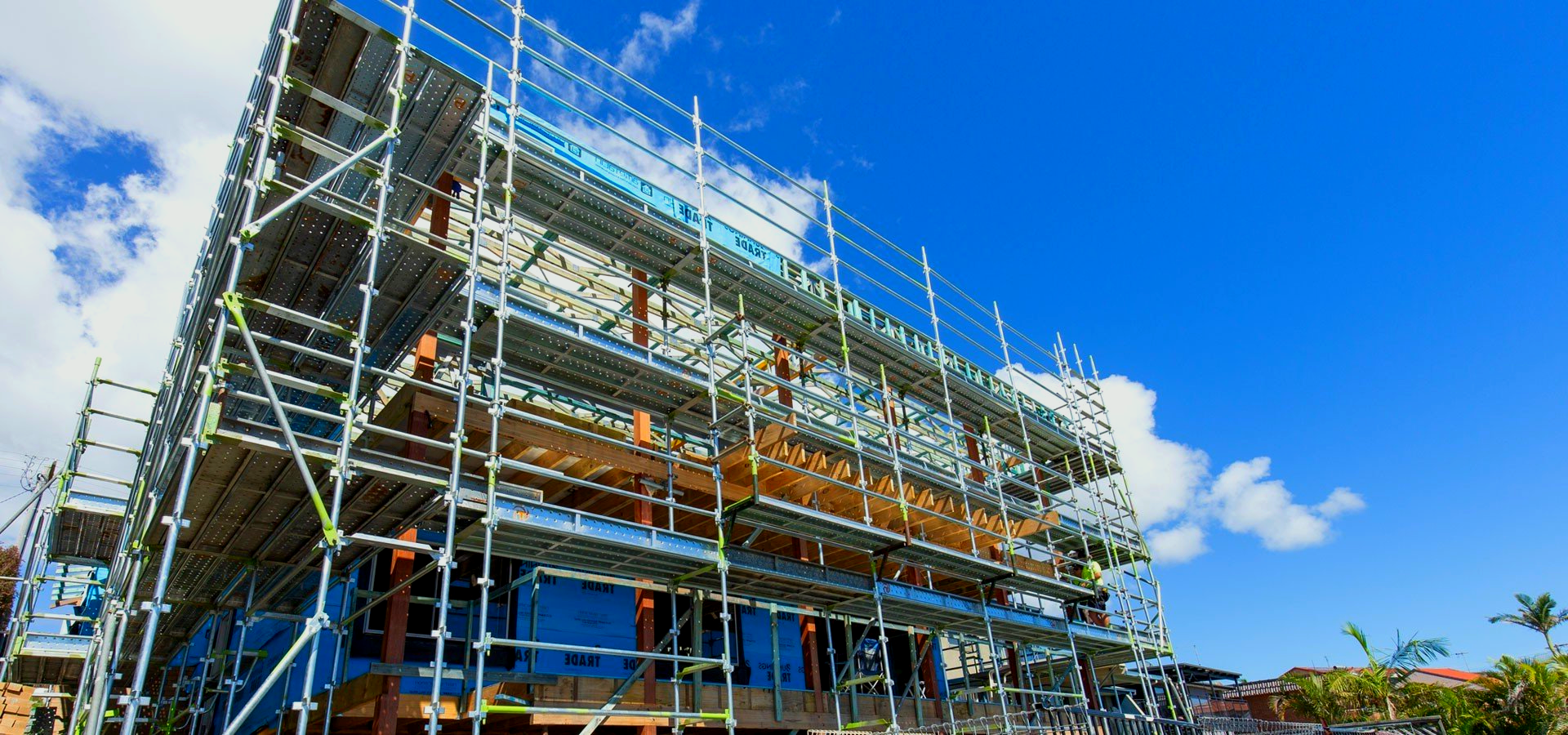 A large building is being built with scaffolding around it.