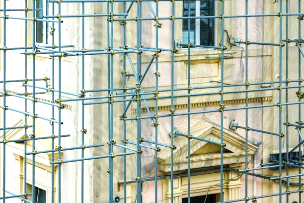 A heritage building with tube and clamp scaffolding around it.
