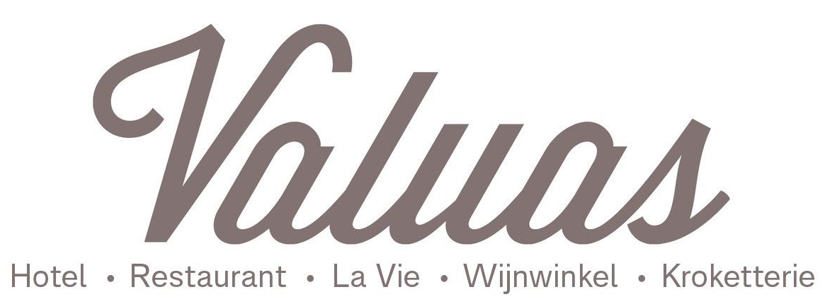 Logo voor Valuas, een bedrijf dat hotel-, restaurant-, La Vie- en andere diensten aanbiedt. Grijs lettertype op een witte achtergrond.