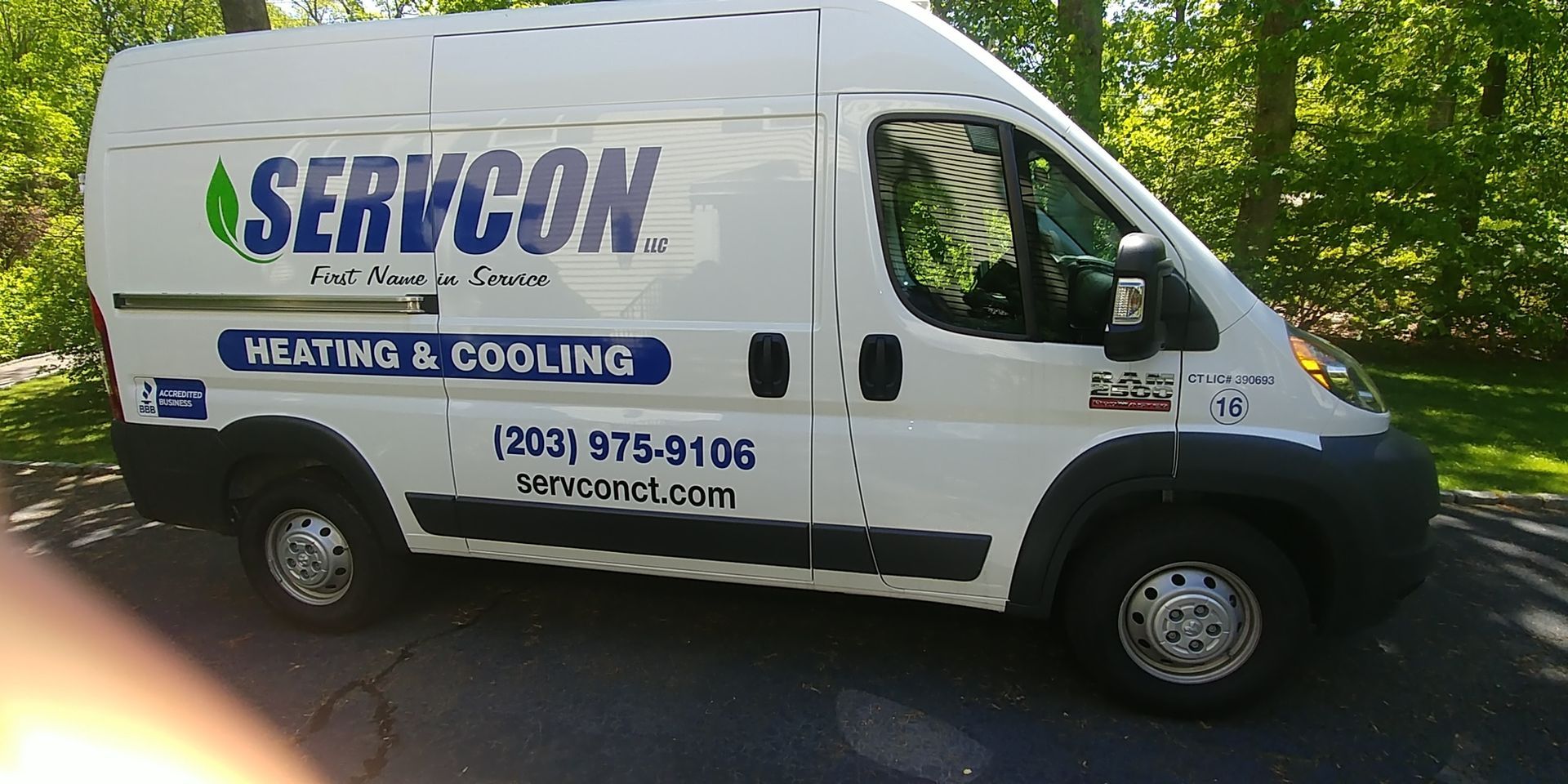 A white van with the word servcon on it