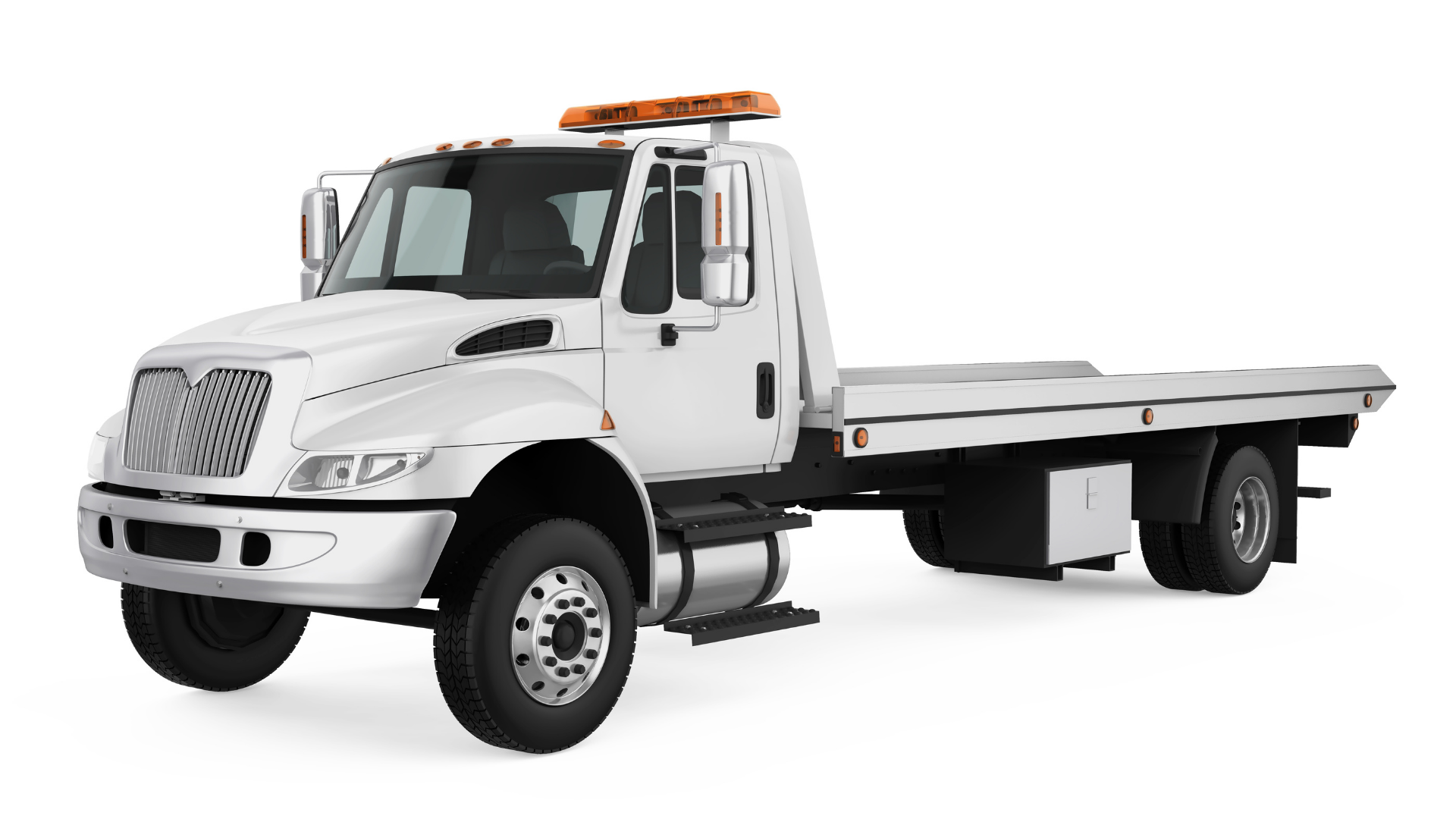 Red tow truck on a paved road, mountains in the background, daytime.