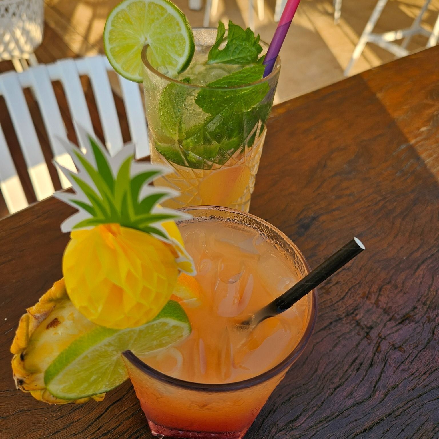 Two Cocktails on a Wooden Table — The Beach Bar and Restaurant at Montes in Airlie Beach, QLD