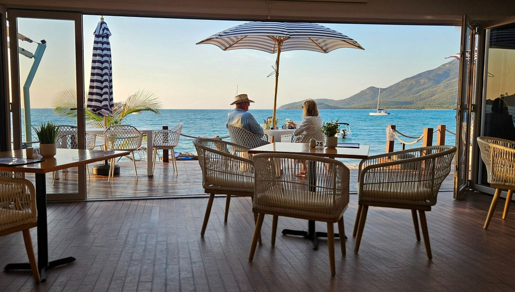 Restaurant Patio With Ocean View — The Beach Bar and Restaurant at Montes in Airlie Beach, QLD