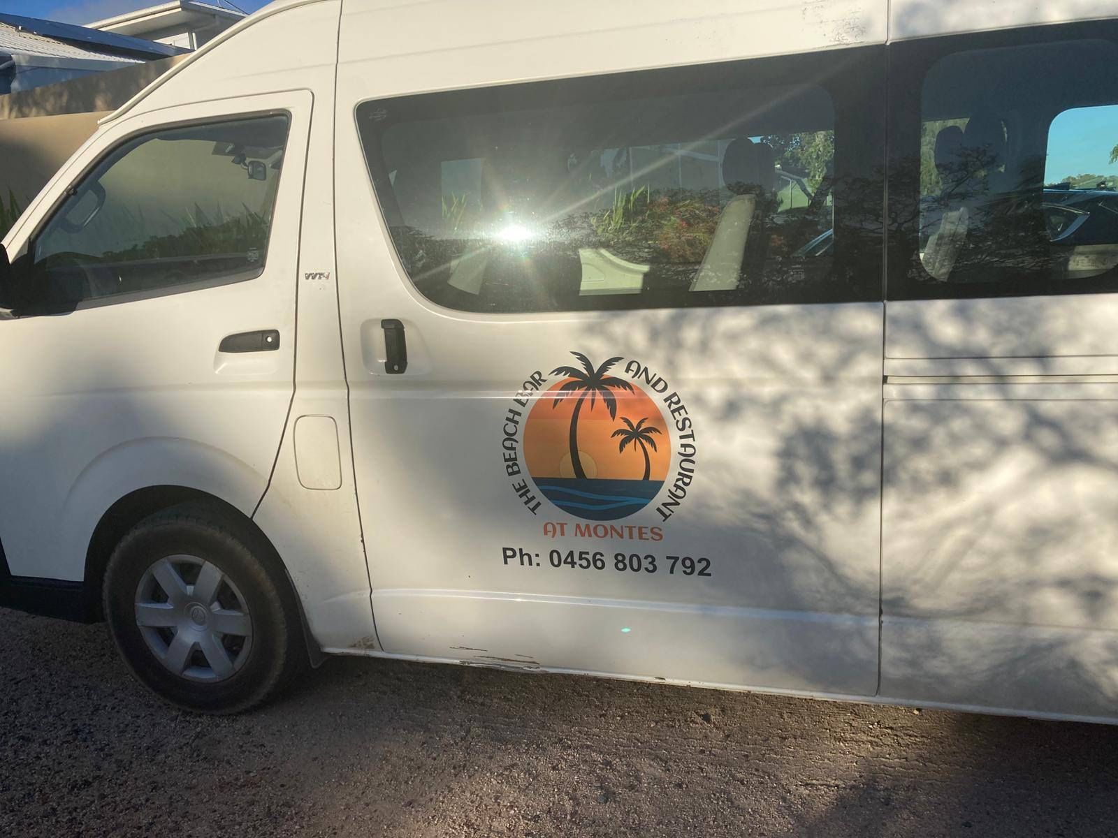 White Van With a Logo of a Palm Tree on It — The Beach Bar and Restaurant at Montes in Cape Gloucester, QLD