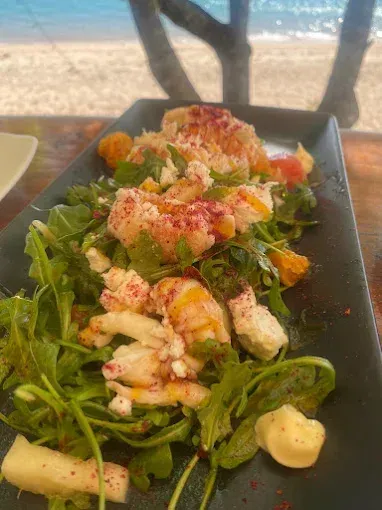 Salad with greens, seafood, and cheese — The Beach Bar and Restaurant at Montes in Cape Gloucester, QLD