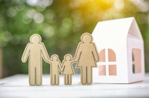 Paper Family with Paper House on The Back — Raymore, MO — Stan Ruby Insurance Agency