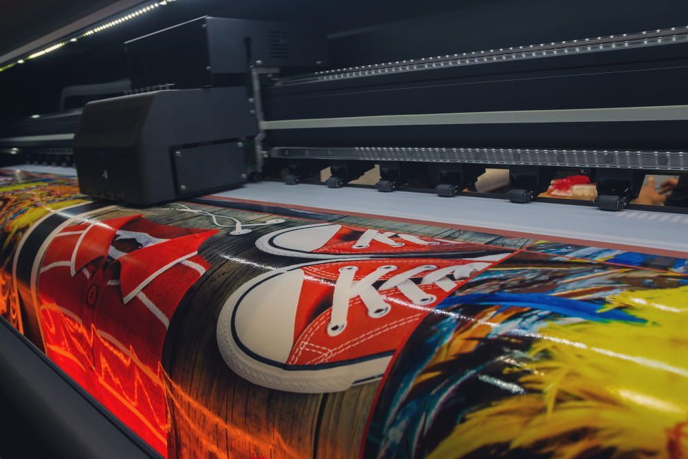 Printer Produces a Vibrant Print of Red Sneakers on Glossy Paper — DXMA Designs In Bargo, NSW