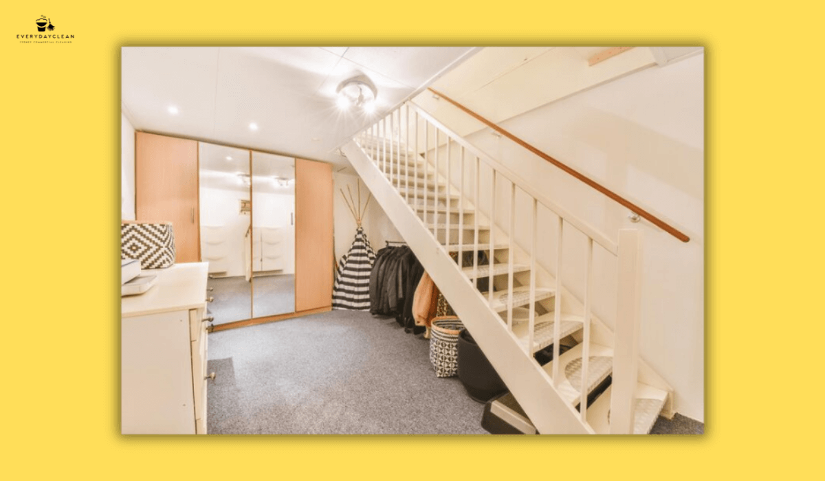 cleaner carrying supplies up stairs