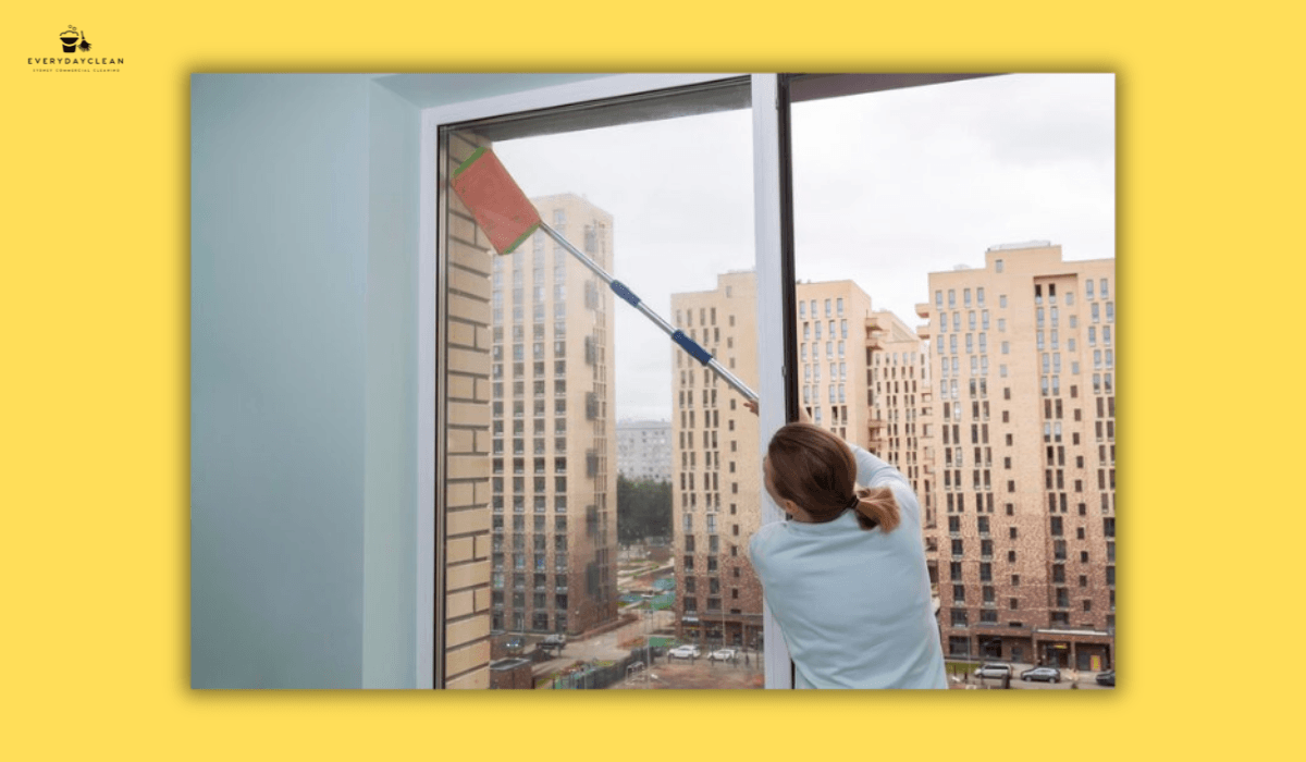cleaning apartment balcony city view
