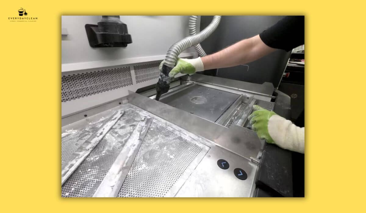 cleaning behind equipment