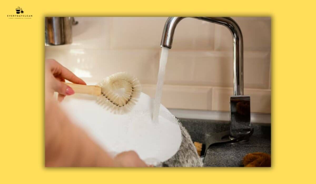 cleaning under the sink
