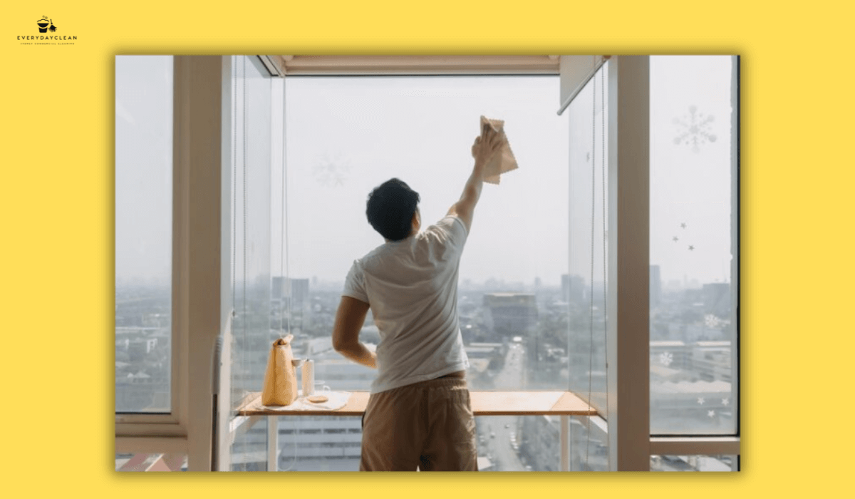 cleaning windows on overcast day
