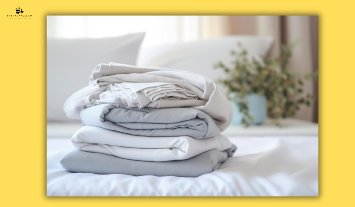 folding clean bed sheets