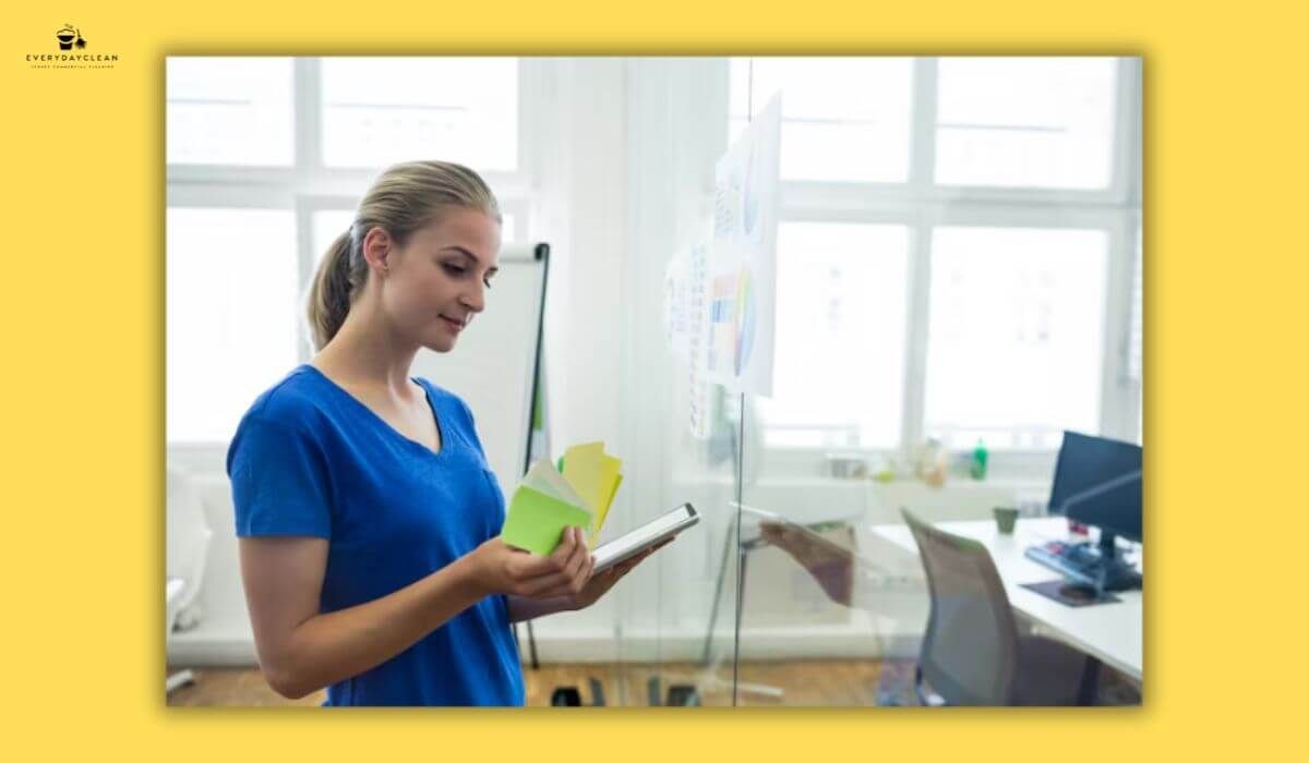 manager checking office cleaning checklist