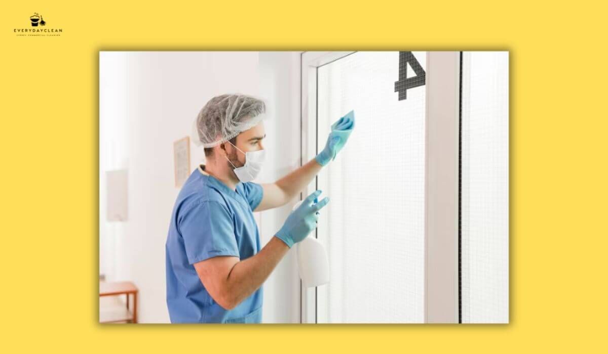 medical staff cleaning patient's room
