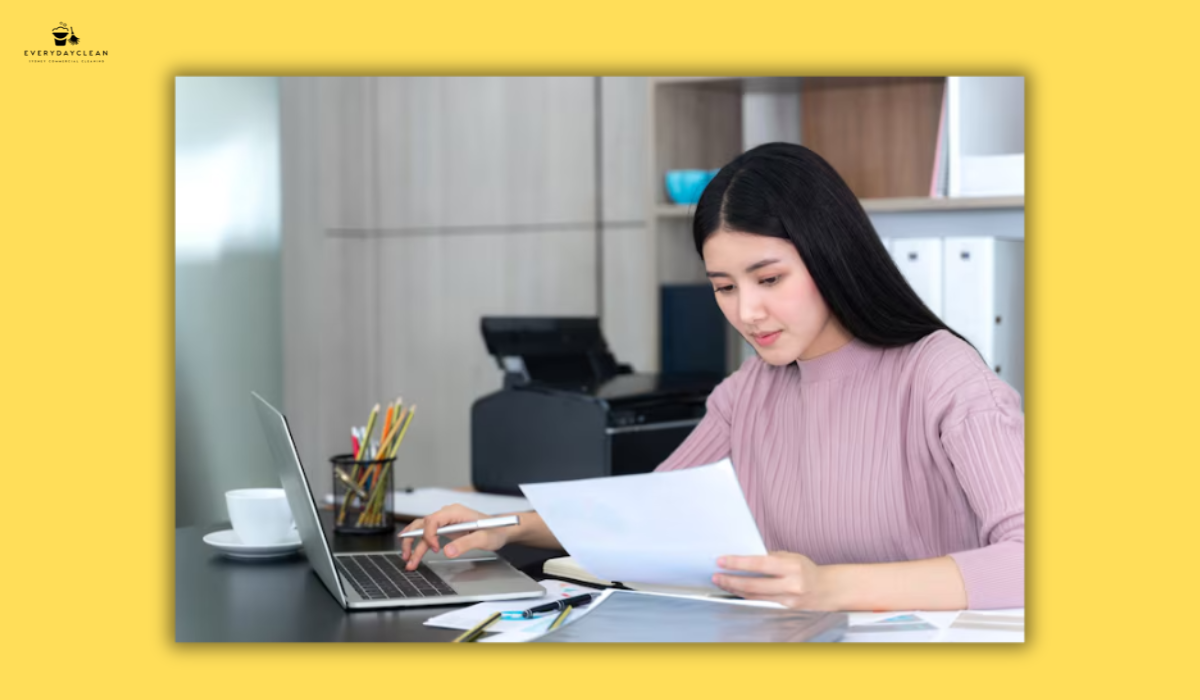 property manager calculating cost on laptop