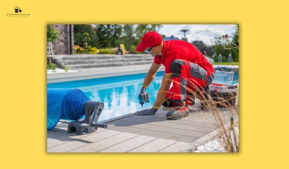 technician maintaining pool cleaner