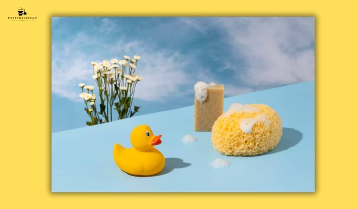 washing toys in soapy water
