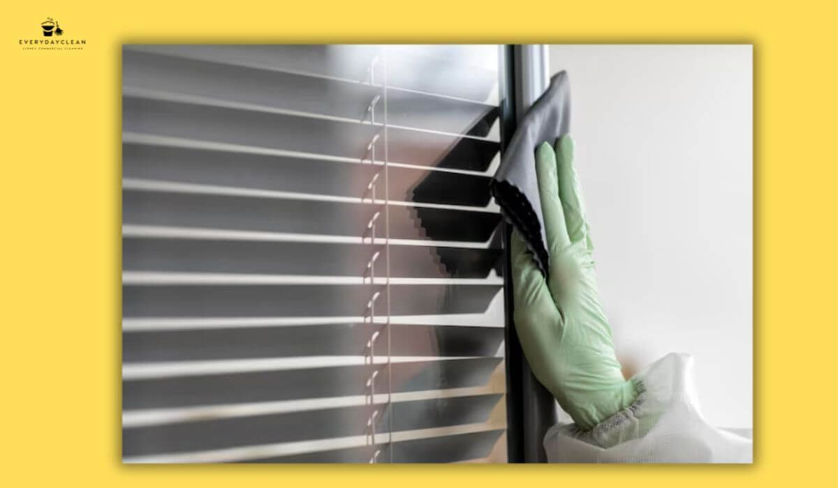  wiping dirty blinds
