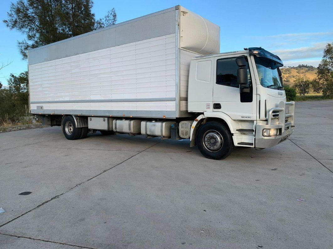 A White Truck is Parked in a Parking Lot — Buck Removals & Storage in Griffith, NSW