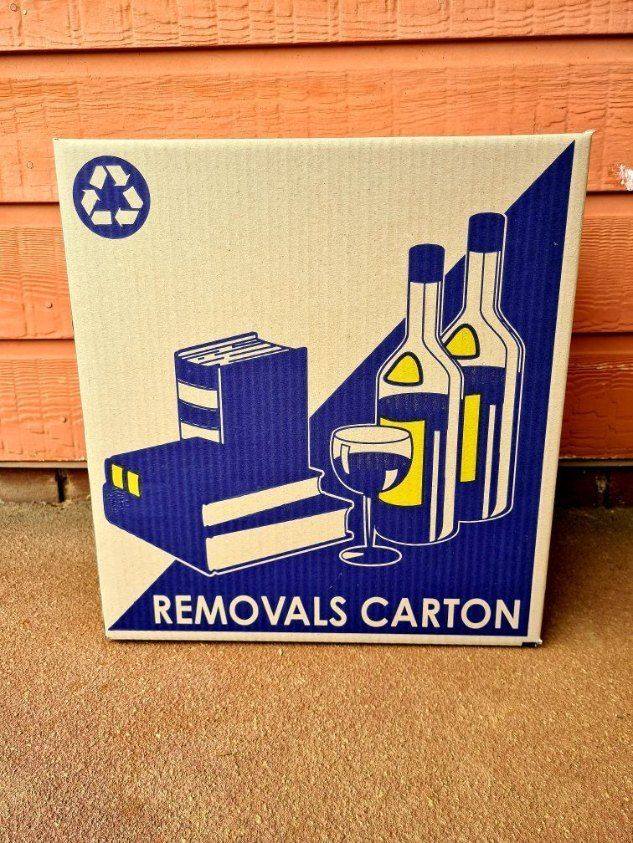 A Cardboard Box That Says Removals Carton on It — Buck Removals & Storage in Cowra, NSW