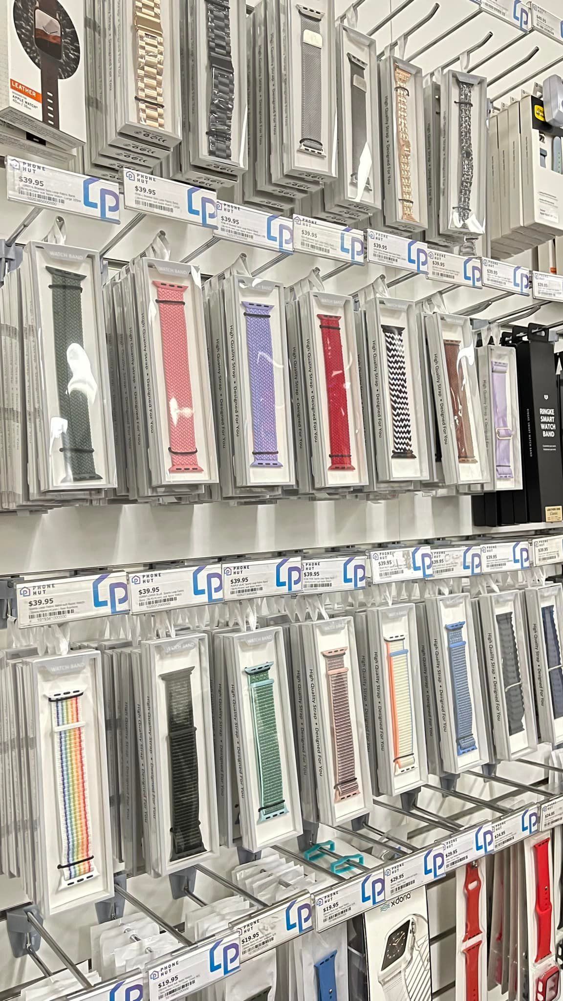 Rows of Packaged Watch Bands on Display Shelves — Phone Hut in Alice Springs, NT
