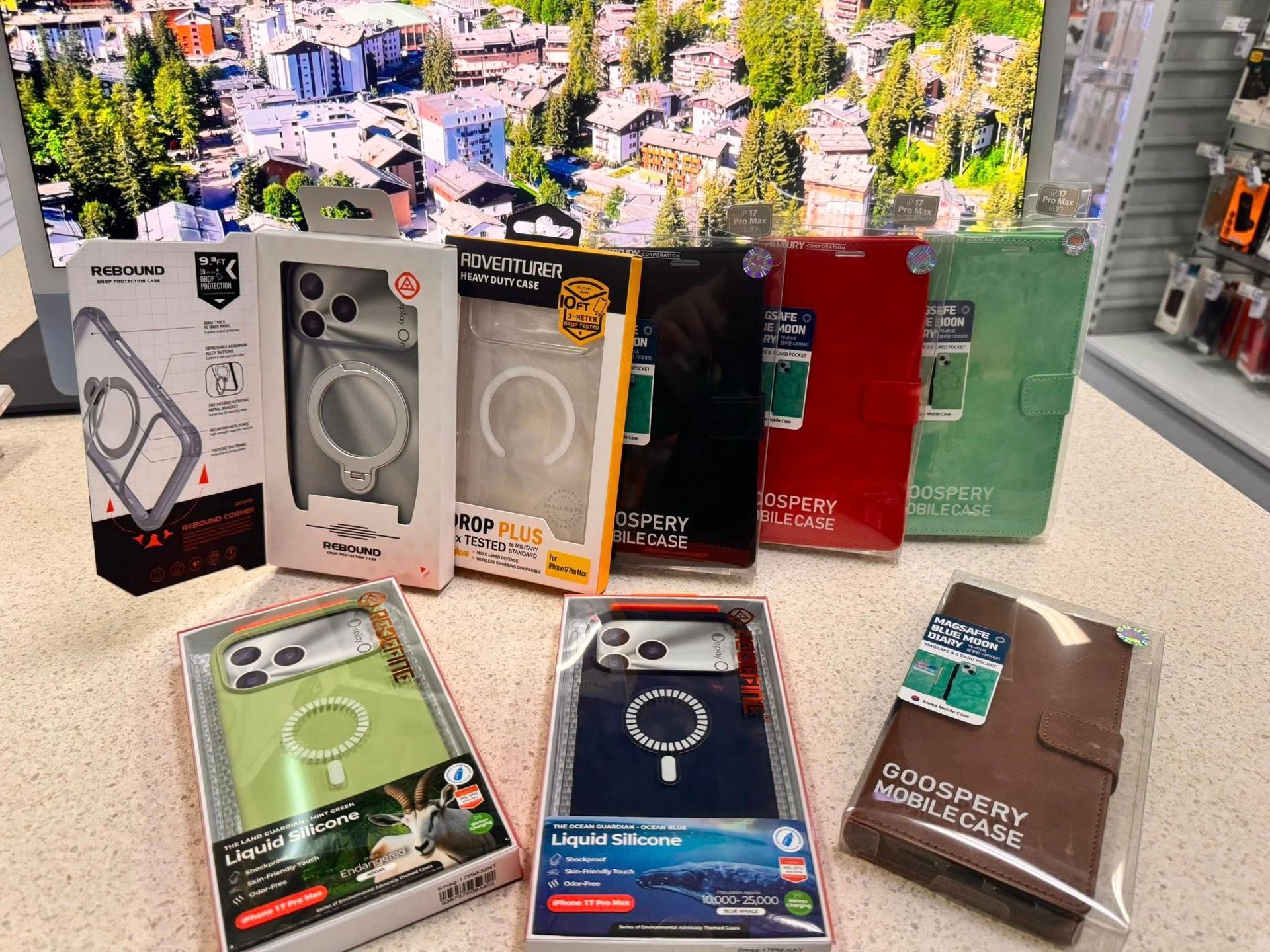 Phone Cases in Packaging on a Counter With a Landscape — Phone Hut in Alice Springs, NT