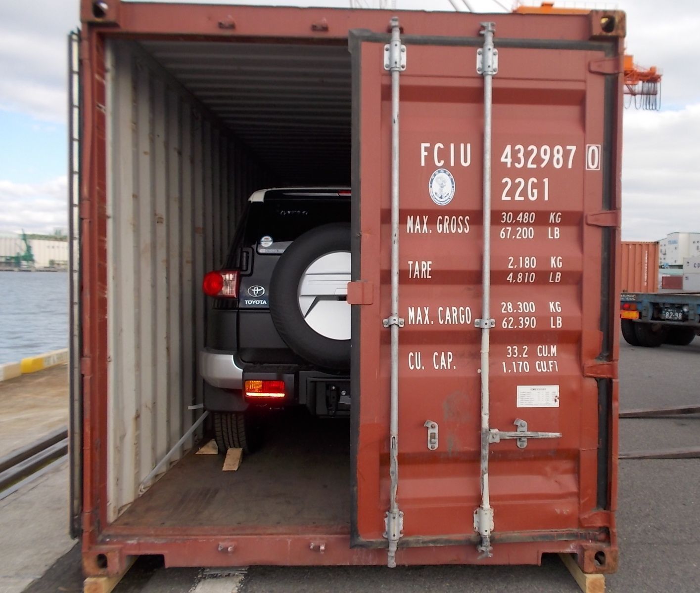 Car secured inside a shipping container waiting to be exported. 