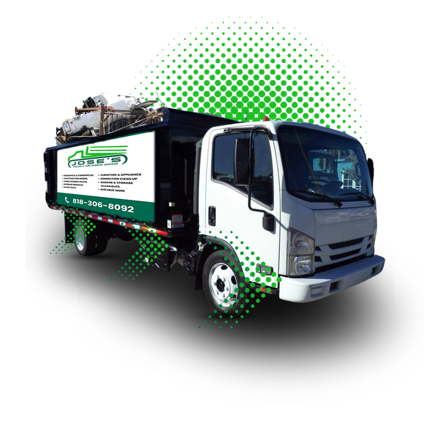 A garbage truck is sitting on a white surface with a green background.