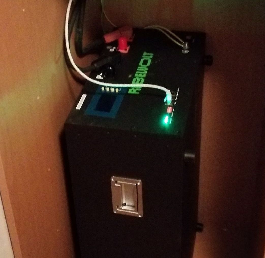 Black battery unit labeled