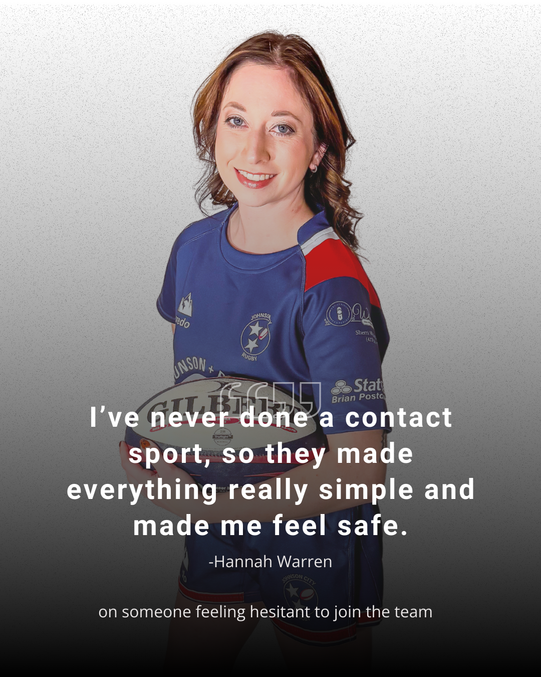 A woman in a blue shirt is holding a rugby ball