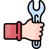 A hand is holding a wrench and giving a thumbs up.