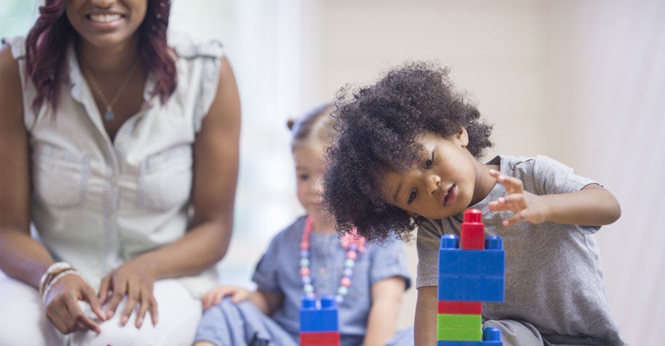 Kids playing with lego