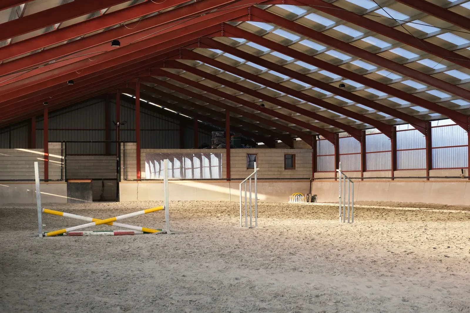 A large indoor arena with a clear roof