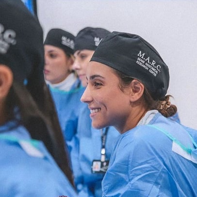 Miami Beach Dental Solutions - Dr Flores on a blue suit