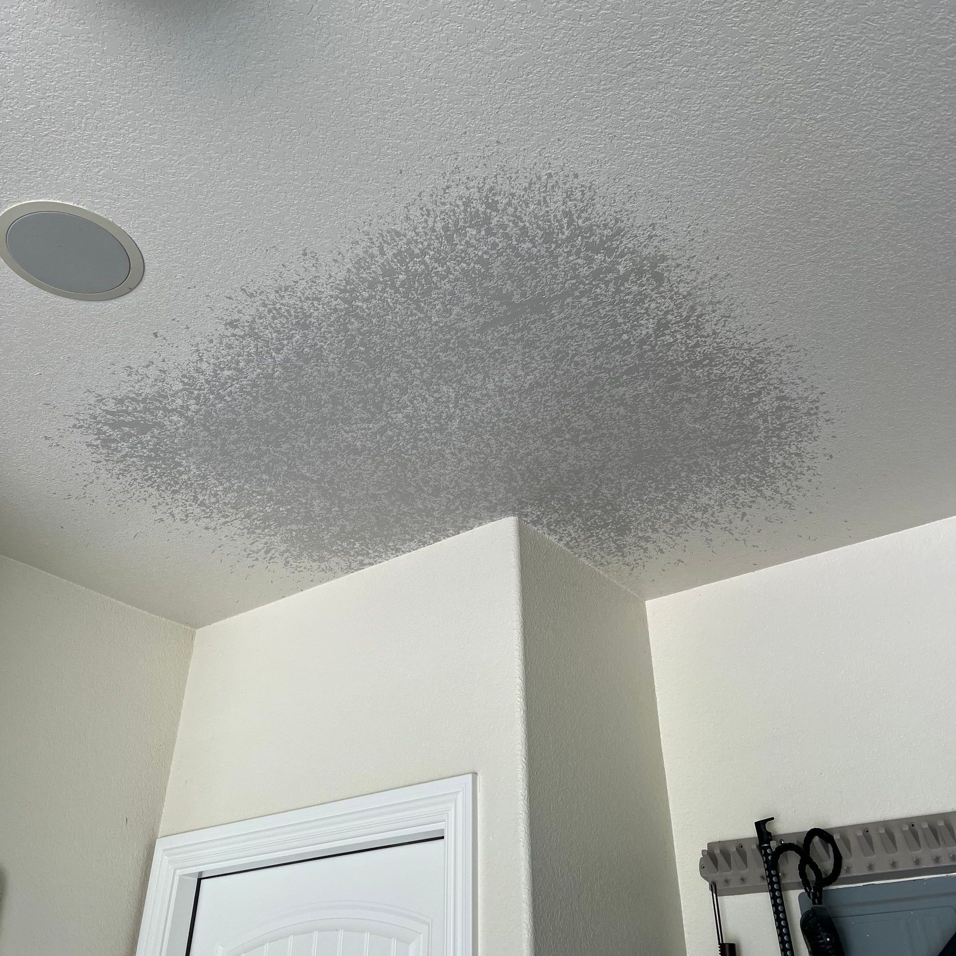 A ceiling drywall repair. Knockdown Texture repair.