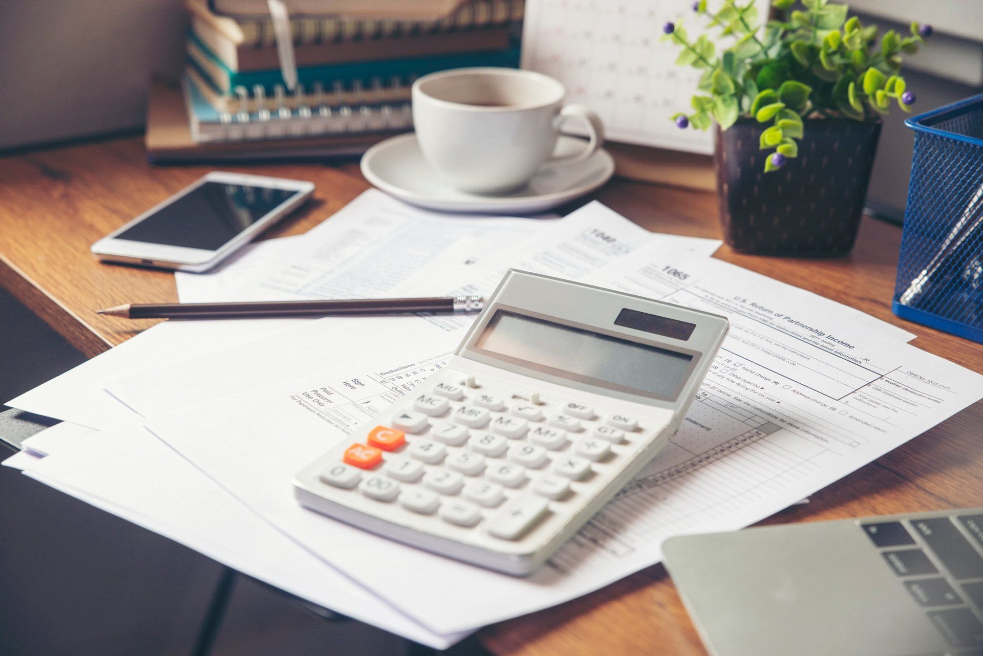 Calculator and Papers — Wollongong NSW — Pellegrino Perri Accountants & Financial Planners