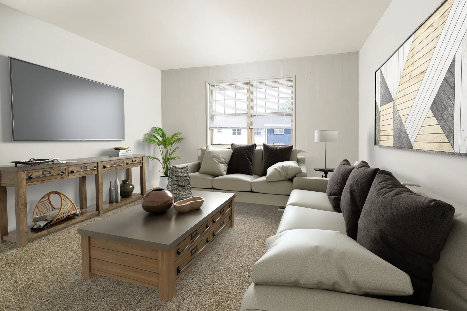 Living room with beige sectional sofa, coffee table, wall-mounted TV, and a large window.