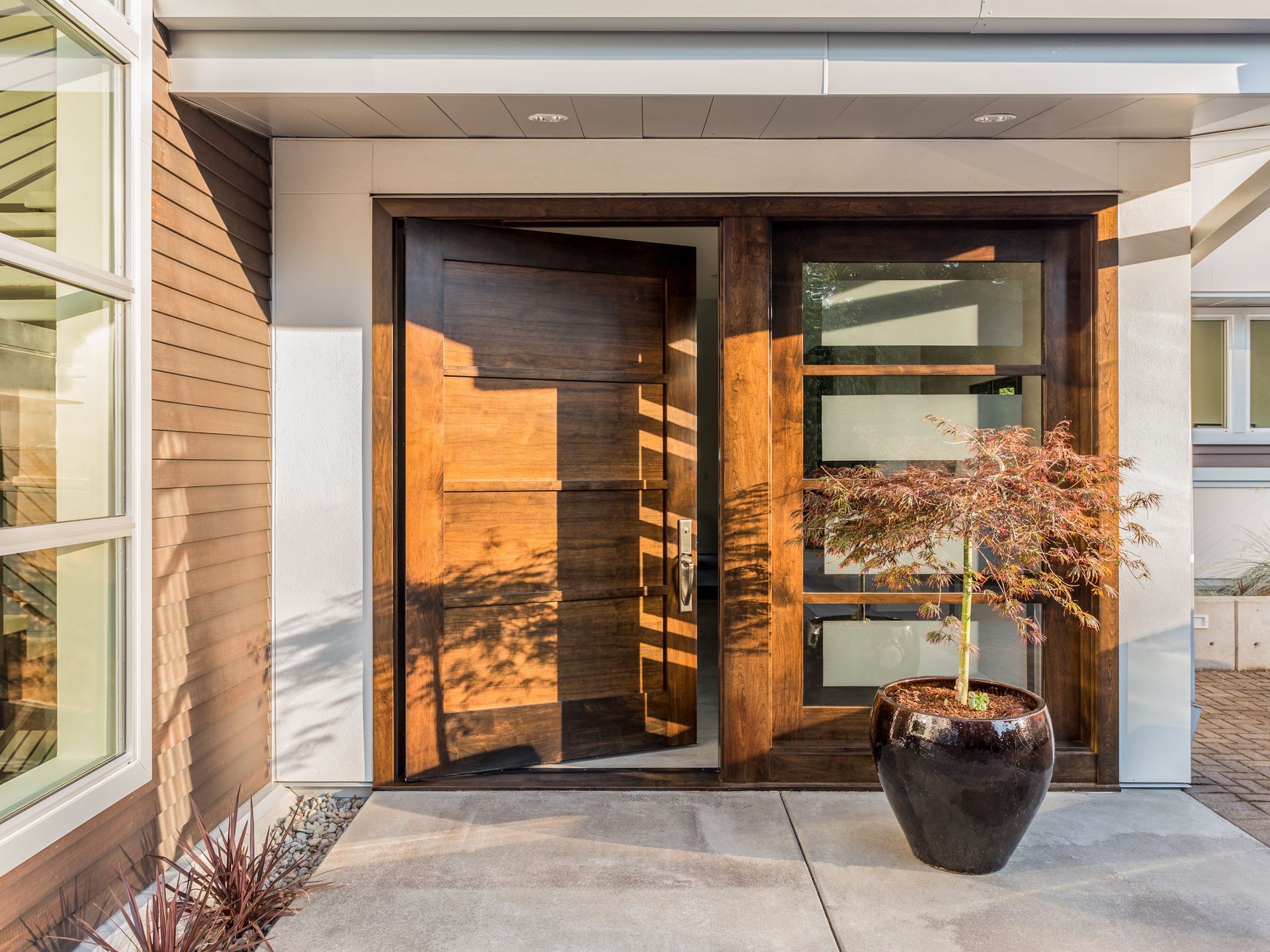 Wooden front door with glass panels