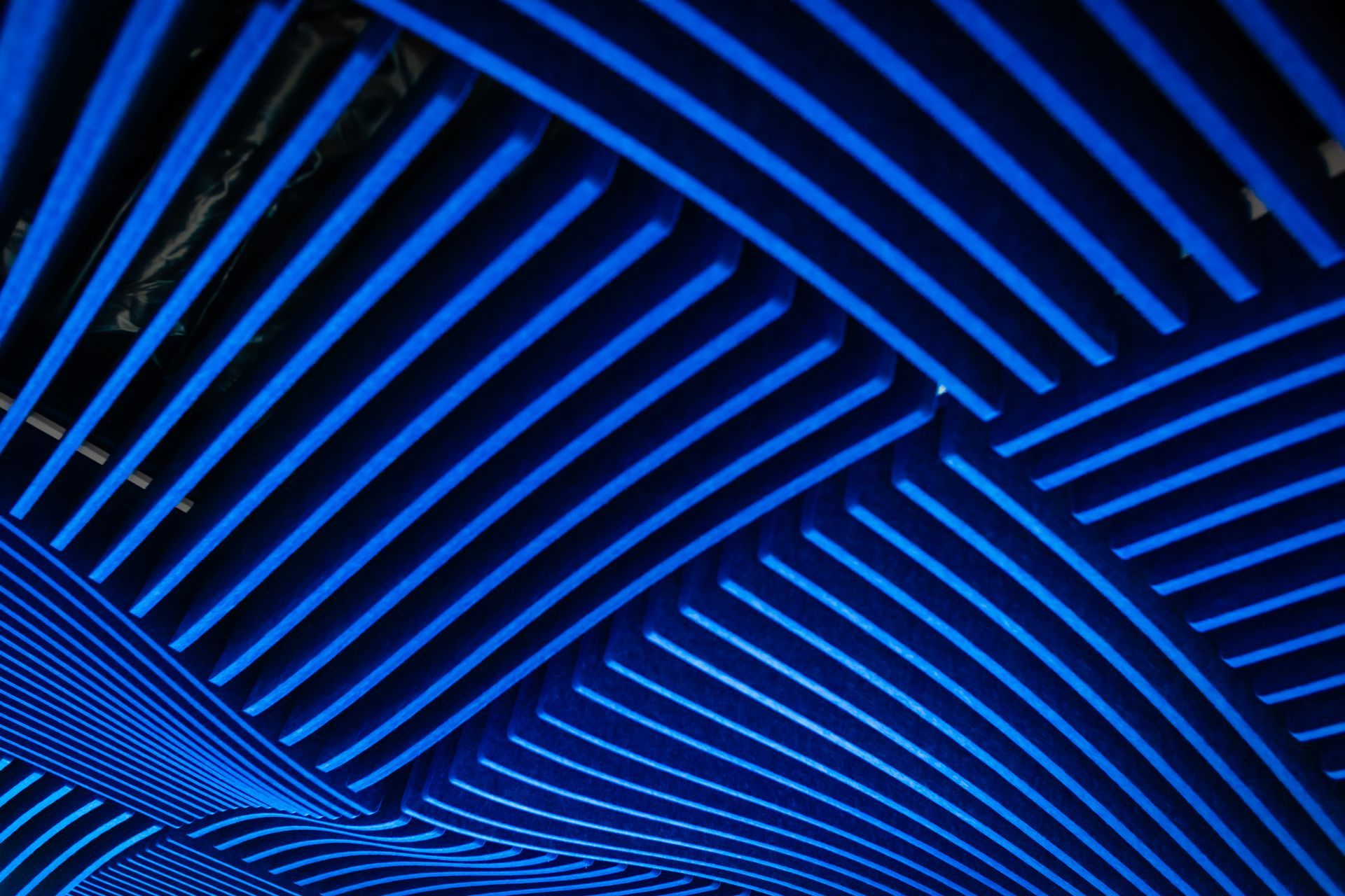 A bunch of blue lines on a black background