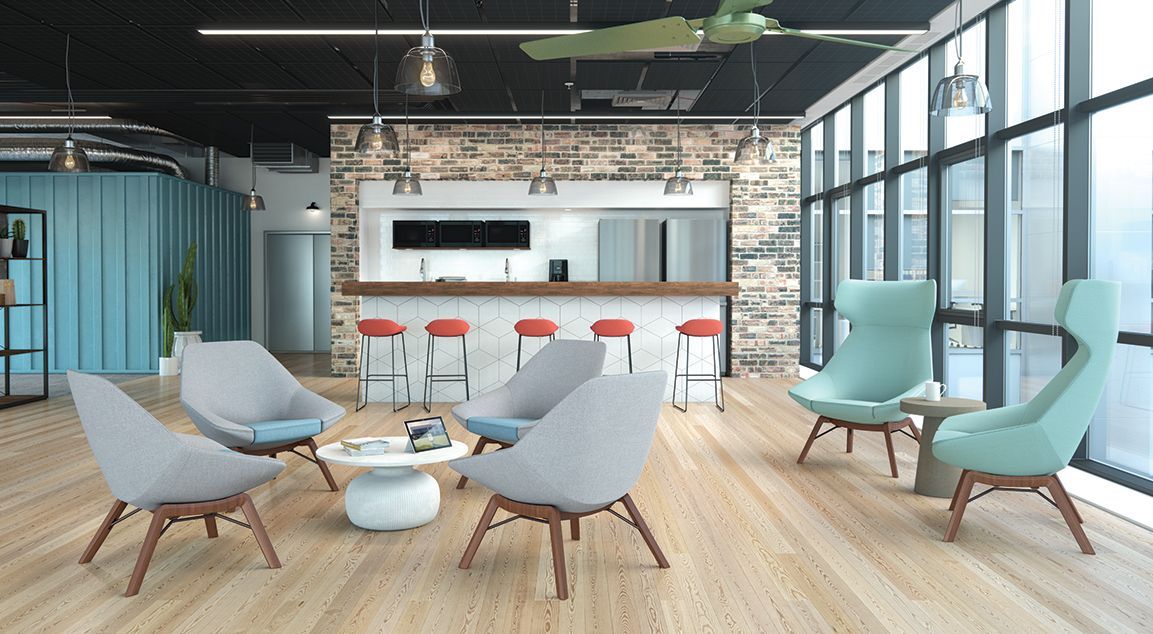 There are many chairs and tables in the room.