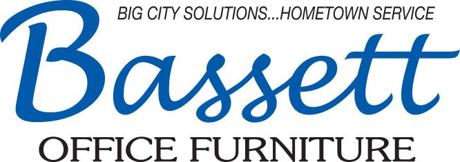 The logo for bassett office furniture is blue and black